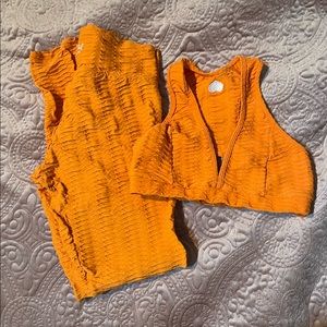 Booty by Brabants original Leggings and Sports Bras in orange and a print